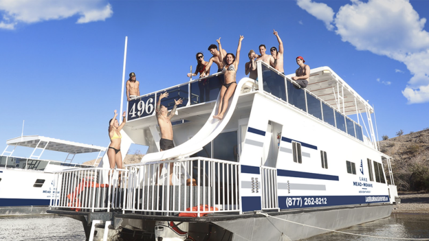 Group of people on a house boat